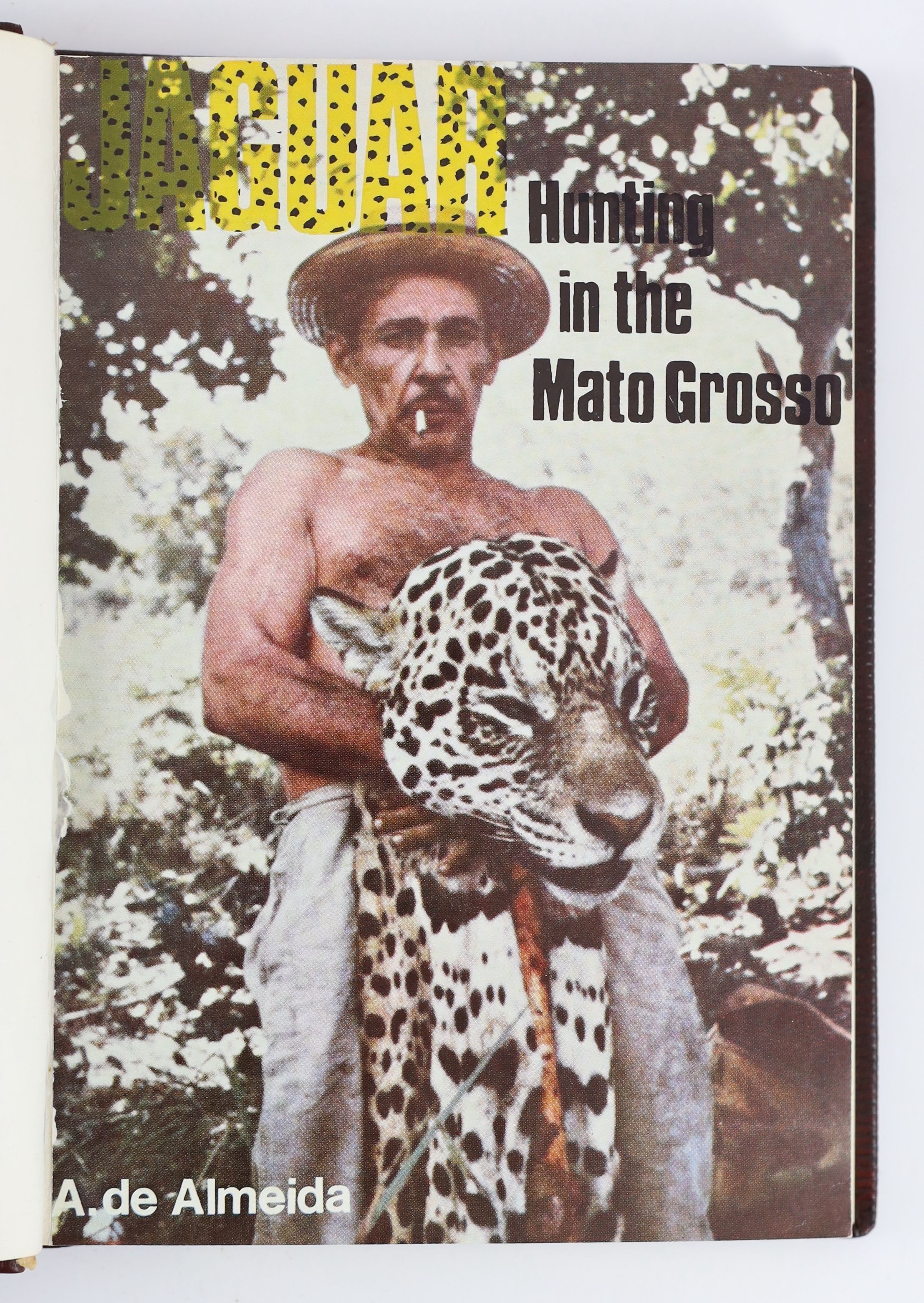 Almeida, Antonio A. Jaguar Hunting in the Mato Grosso. Stanwill Press, 1976. Full dark brown leather binding, gilt, with the original stiff paper wrapper bound in. * With a presentation inscription on the second free end
